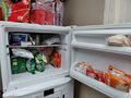 Pawprint Prototyping fridge peek December 2024.jpg